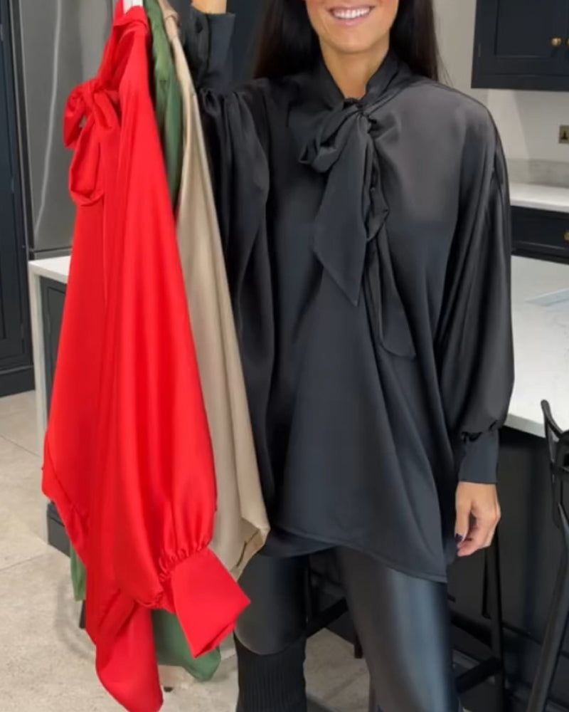 Con nastro monocolore e camicetta elegante
