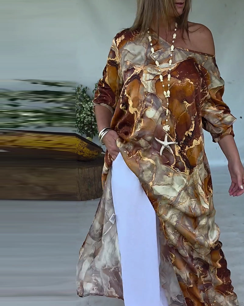 Camicetta stampata alla moda con spacco
