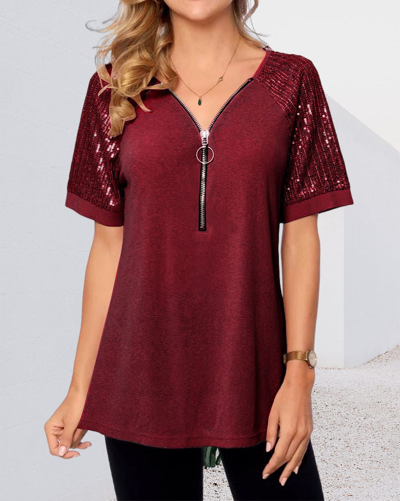 T-shirt con paillettes e maniche corte