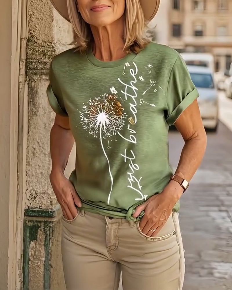 T-shirt a maniche corte stampato con dente di leone