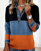 Top tendenza con revers e colore a contrasto