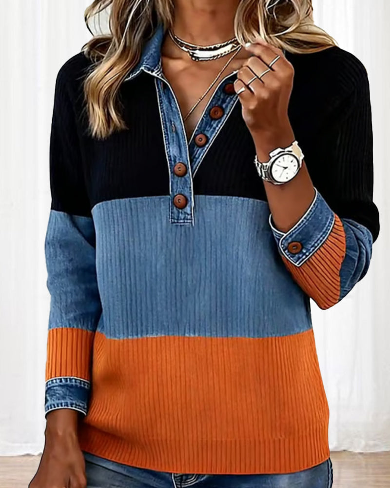 Top tendenza con revers e colore a contrasto