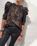 Camicia con maniche a sbuffo e volant
