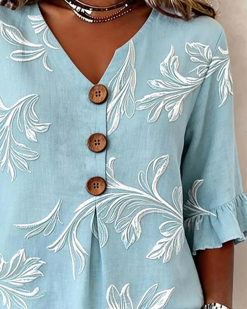 Camicia con ruches sulle maniche e tre bottoni
