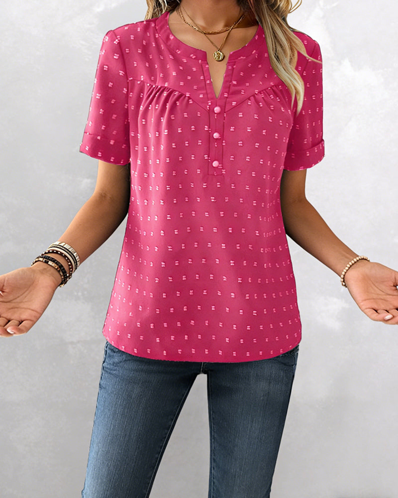Camicetta jacquard con scollo a V, mezza abbottonatura e maniche corte