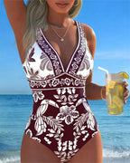 Costume intero con fiori e uccelli tropicali