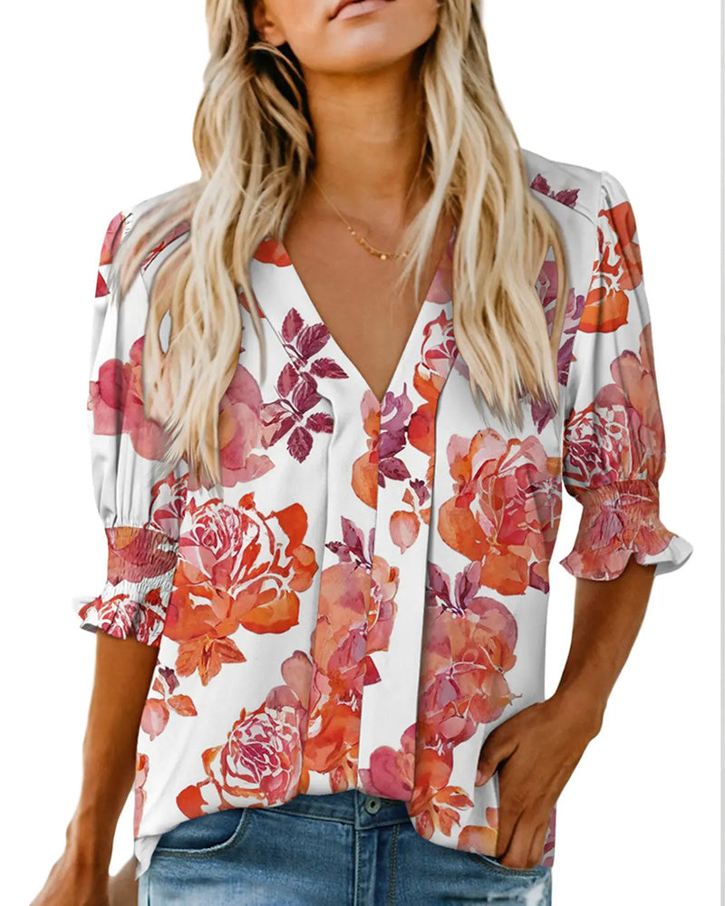 Camicetta elegante con piccola stampa floreale