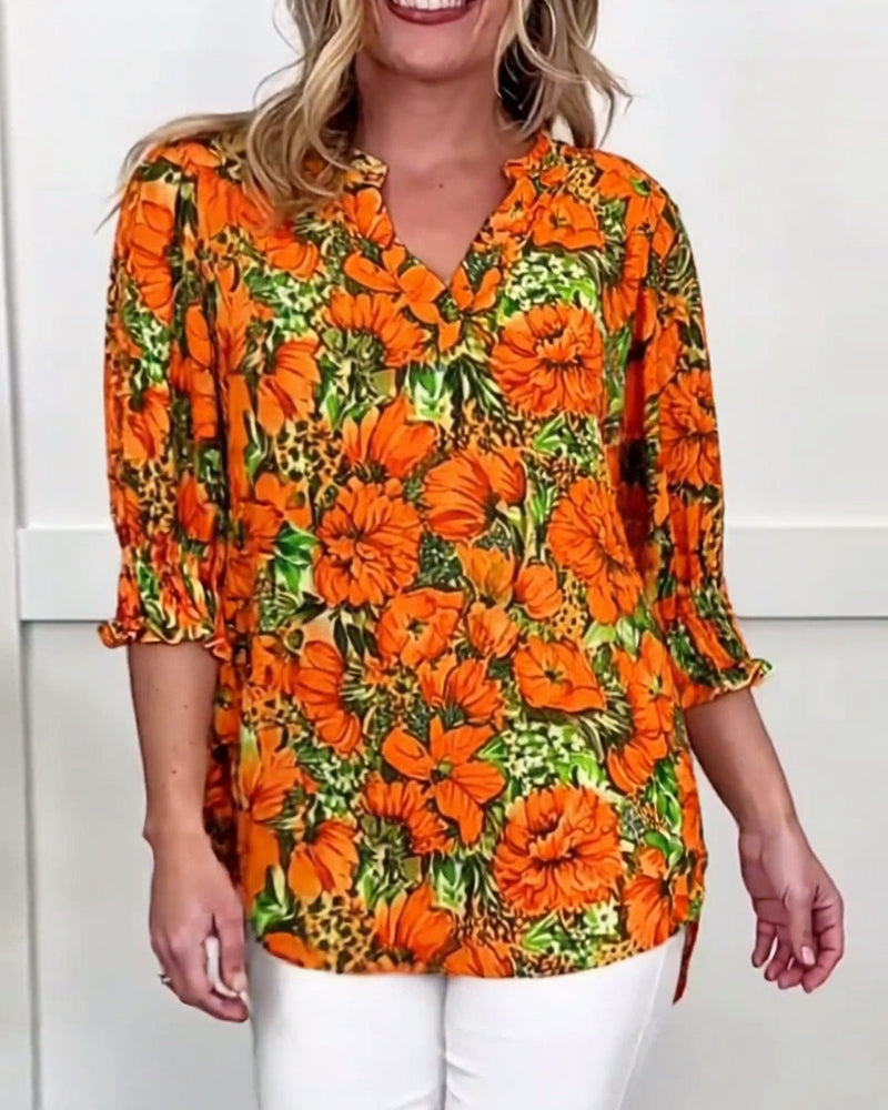 Blusa a maniche corte di tendenza floreale