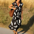 Magda - Abito svasato con scollo a V