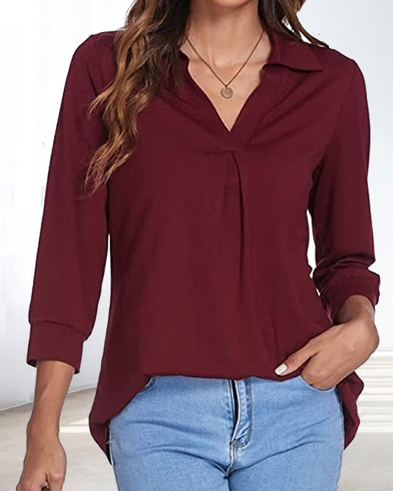 T-shirt a tinta unita con scollo a V