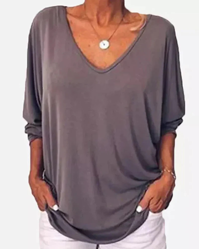 Top scollo a V abbottonato sul retro maniche a 3/4