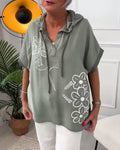 Blusa casual con cappuccio e maniche corte con stampa floreale