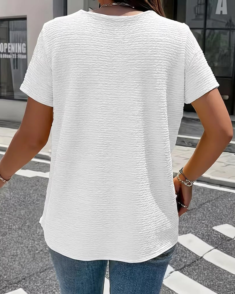 T-shirt con colletto Peter Pan a tre bottoni