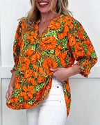 Blusa a maniche corte di tendenza floreale