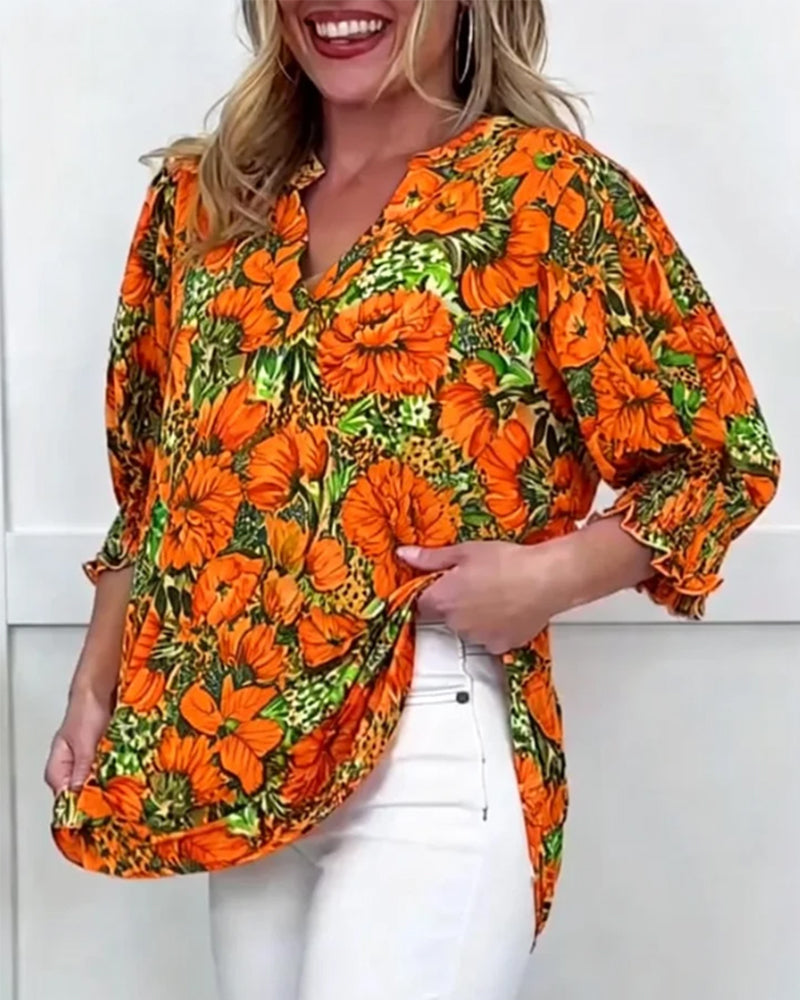 Blusa a maniche corte di tendenza floreale