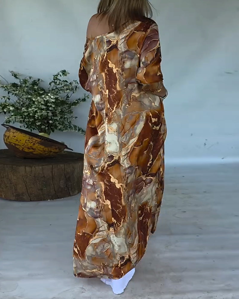 Camicetta stampata alla moda con spacco