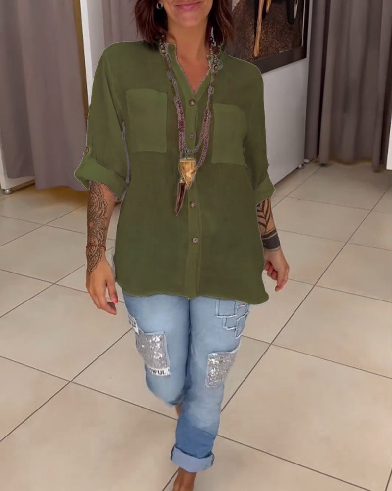 Camicia a tinta unita con tasche e bottoni semplici