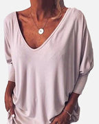 Top scollo a V abbottonato sul retro maniche a 3/4