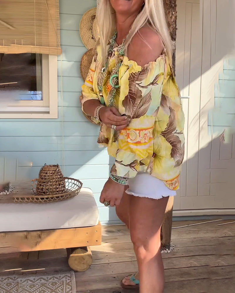 Blusa con scollo Bardot e stampa a tema resort