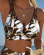 Bikini con bretelle e intagli design