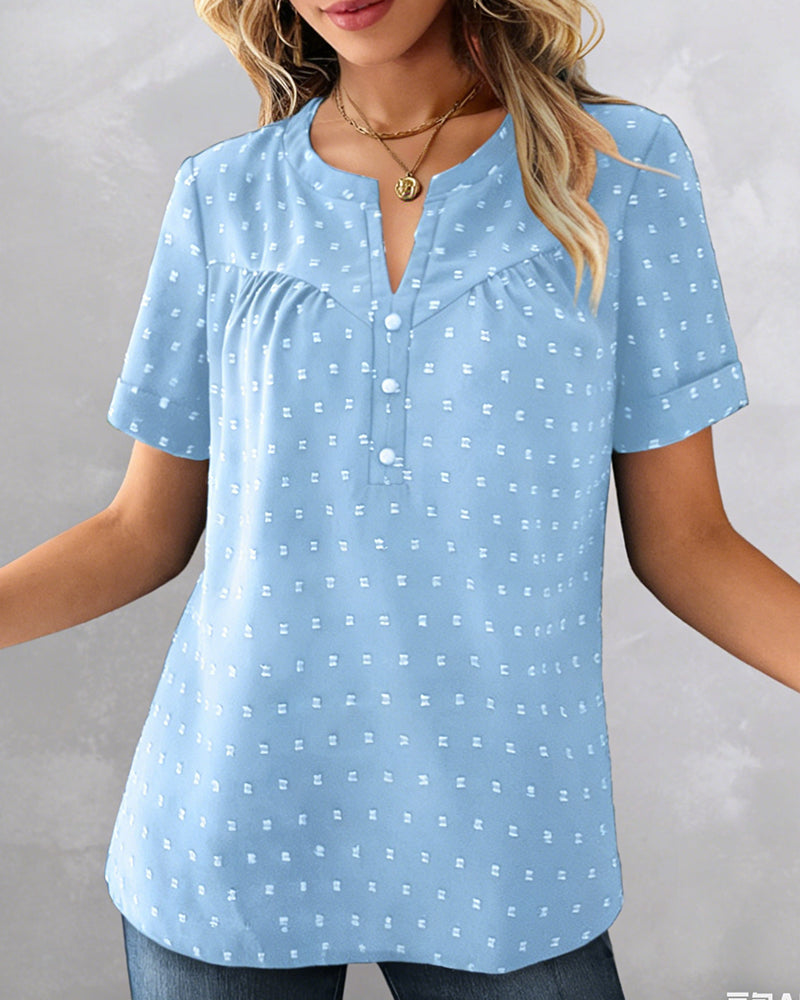 Camicetta jacquard con scollo a V, mezza abbottonatura e maniche corte