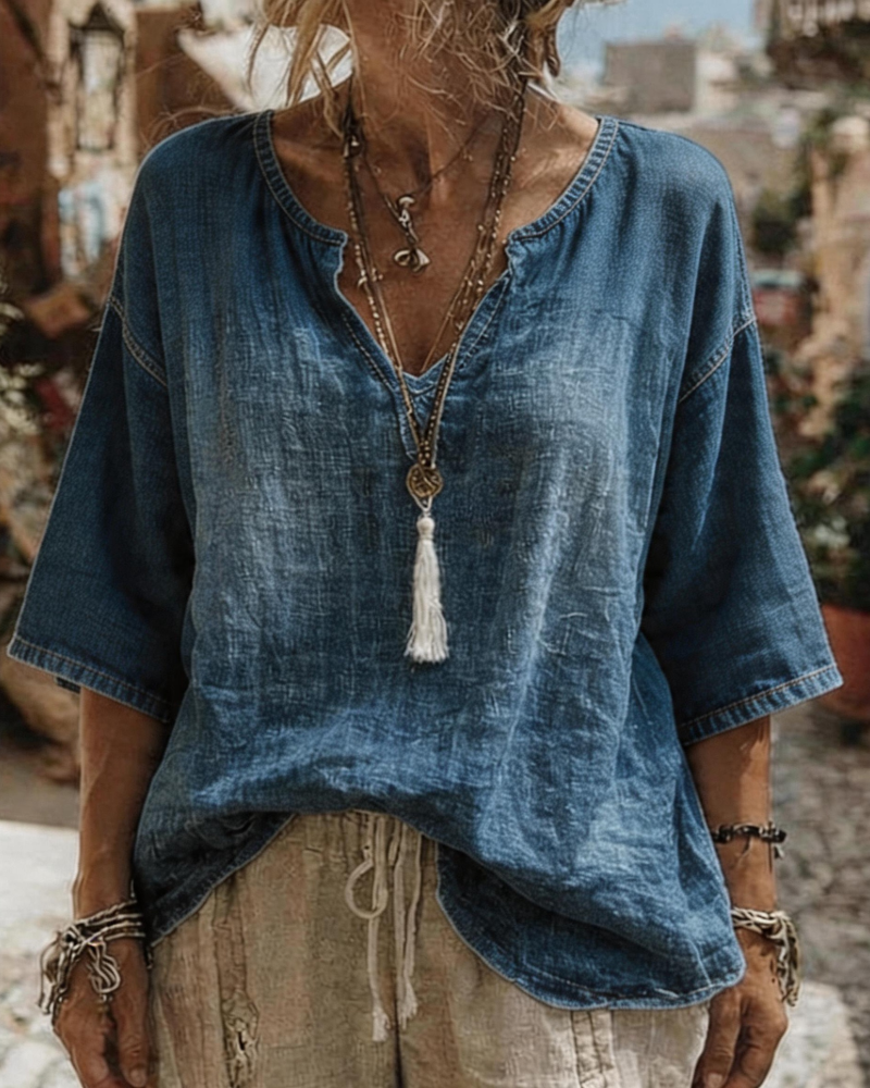 Top con scollo a V in denim a mezza manica