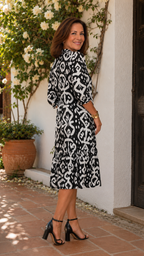 Abito elegante stampato con scollo a V