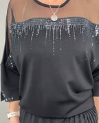 Blusa in maglia a trama larga e vestibilità ampia