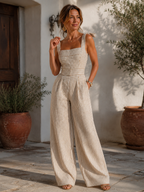 Tuta elegante con fiocco