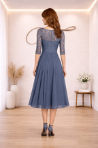 Vestito ricamato illusorio