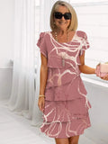 Chantal – Abito elegante e fluido con balze