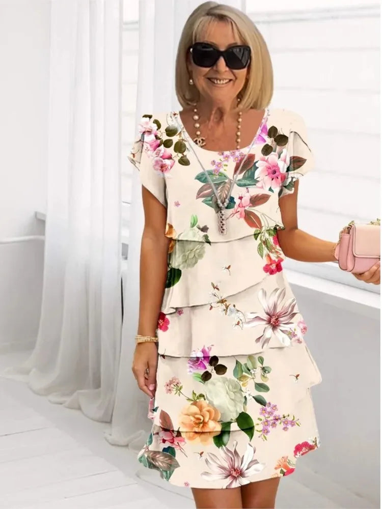 Camille – Abito elegante e fluido con balze