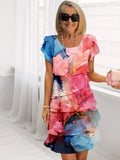 Adèle – Abito elegante e fluido con balze
