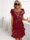 Lucie – Abito elegante e fluido con balze