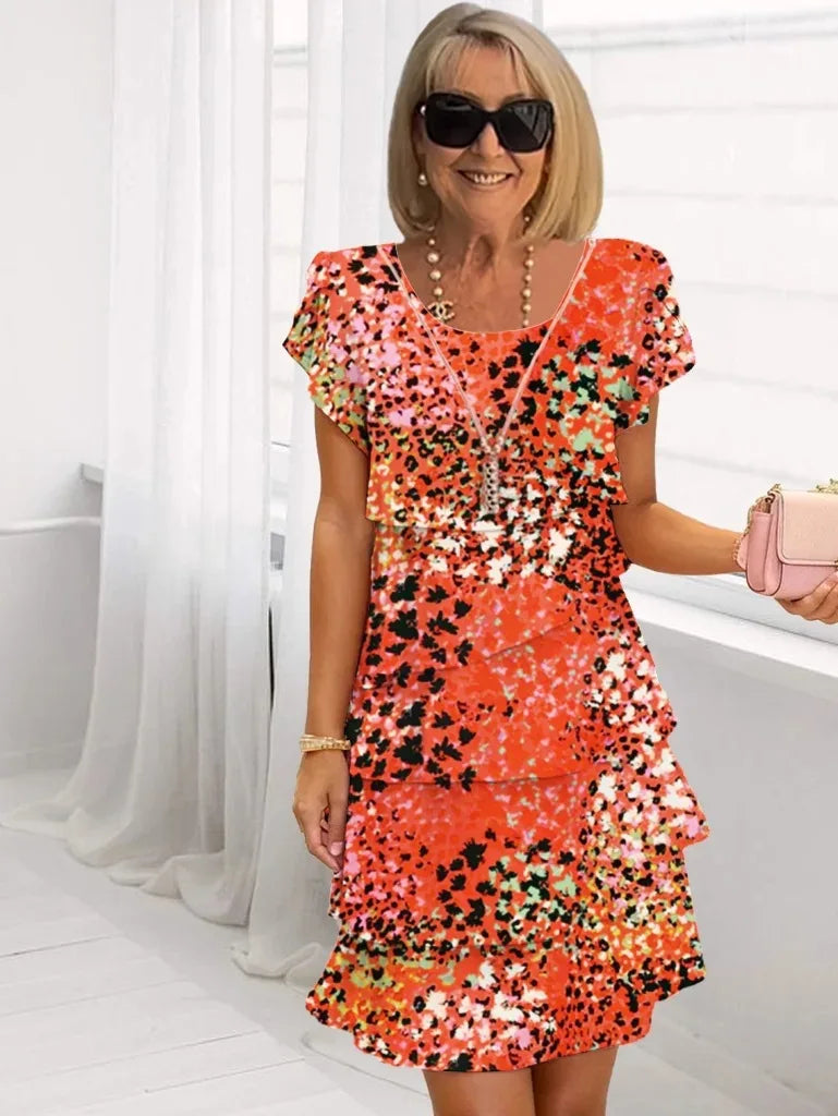 Brigitte – Abito fluido elegante con balze