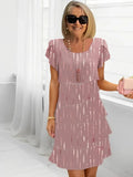 Isabelle – Abito elegante fluido con balze