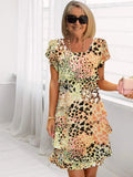 Danielle – Abito elegante e fluido con balze