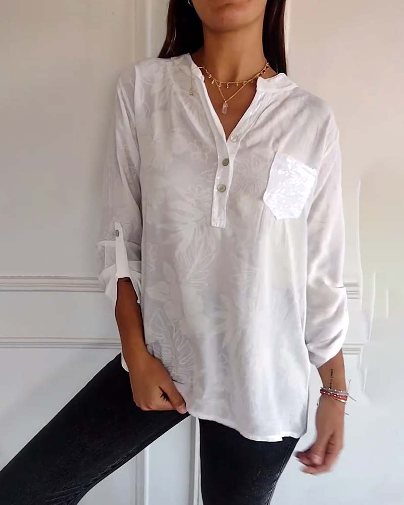 Top stampato foglie con paillettes patchwork