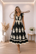 Abito lungo elegante con scollo a V