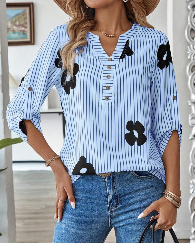 Camicia a righe stampata con scollo a V alla moda