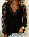 Top elegante a maniche lunghe con scollo a V