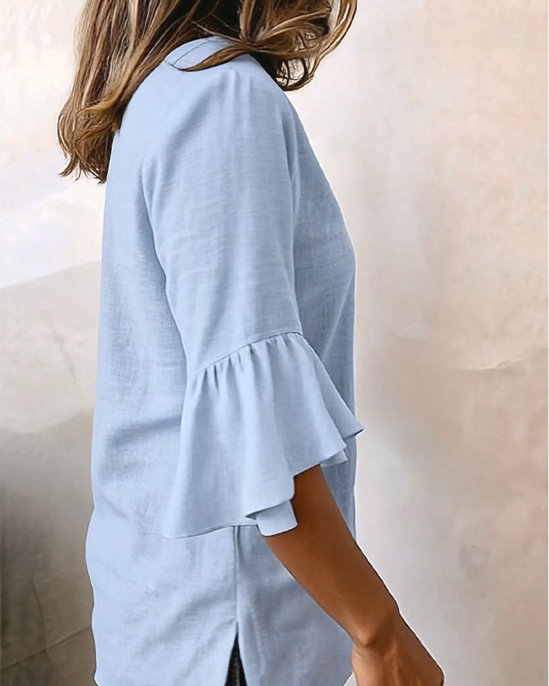 Camicetta con maniche svasate e scollo a V