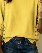 Top casual con scollo rotondo e bottone decorativo