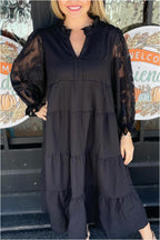 Abito midi nero con maniche floreali trasparenti