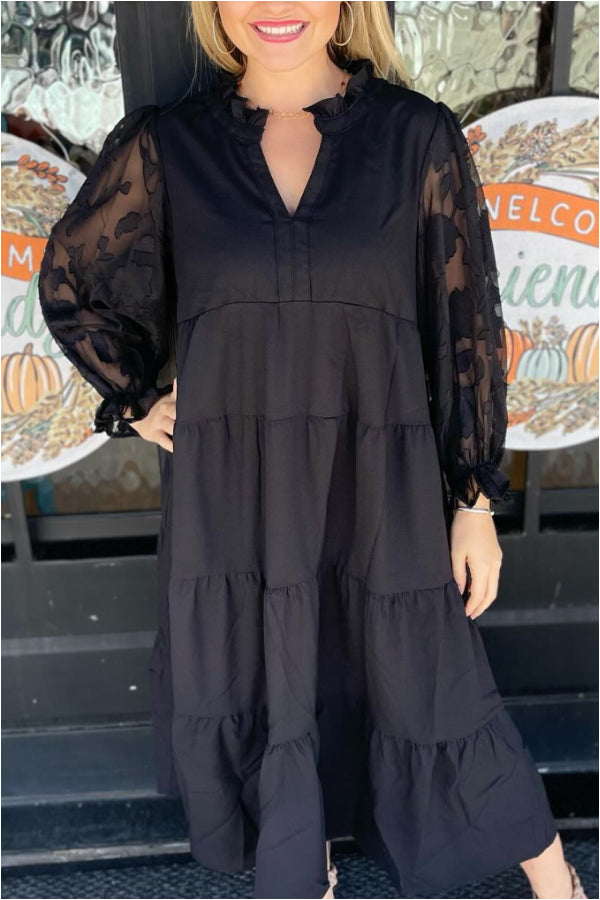Abito midi nero con maniche floreali trasparenti
