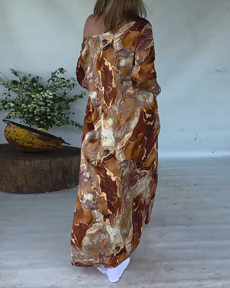 Camicetta stampata alla moda con spacco