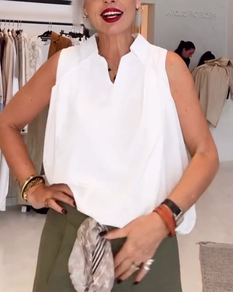 Blusa smanicata con scollo ampio