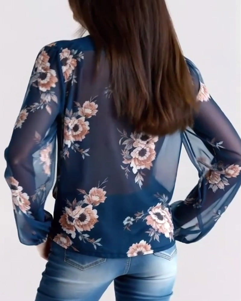 Blusa stampata di tendenza con scollo a V e maniche lunghe