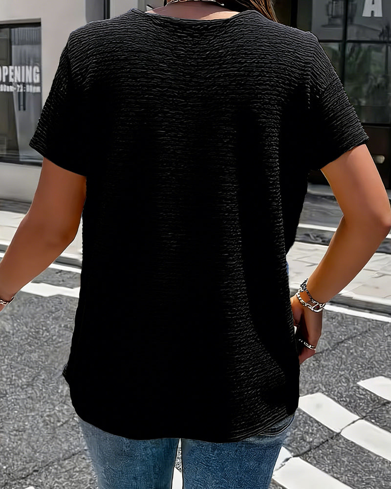 T-shirt con colletto Peter Pan a tre bottoni