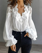 Camicetta in pizzo patchwork con scollo a V